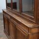Large glass-fronted library in rosewood from the 19th century.