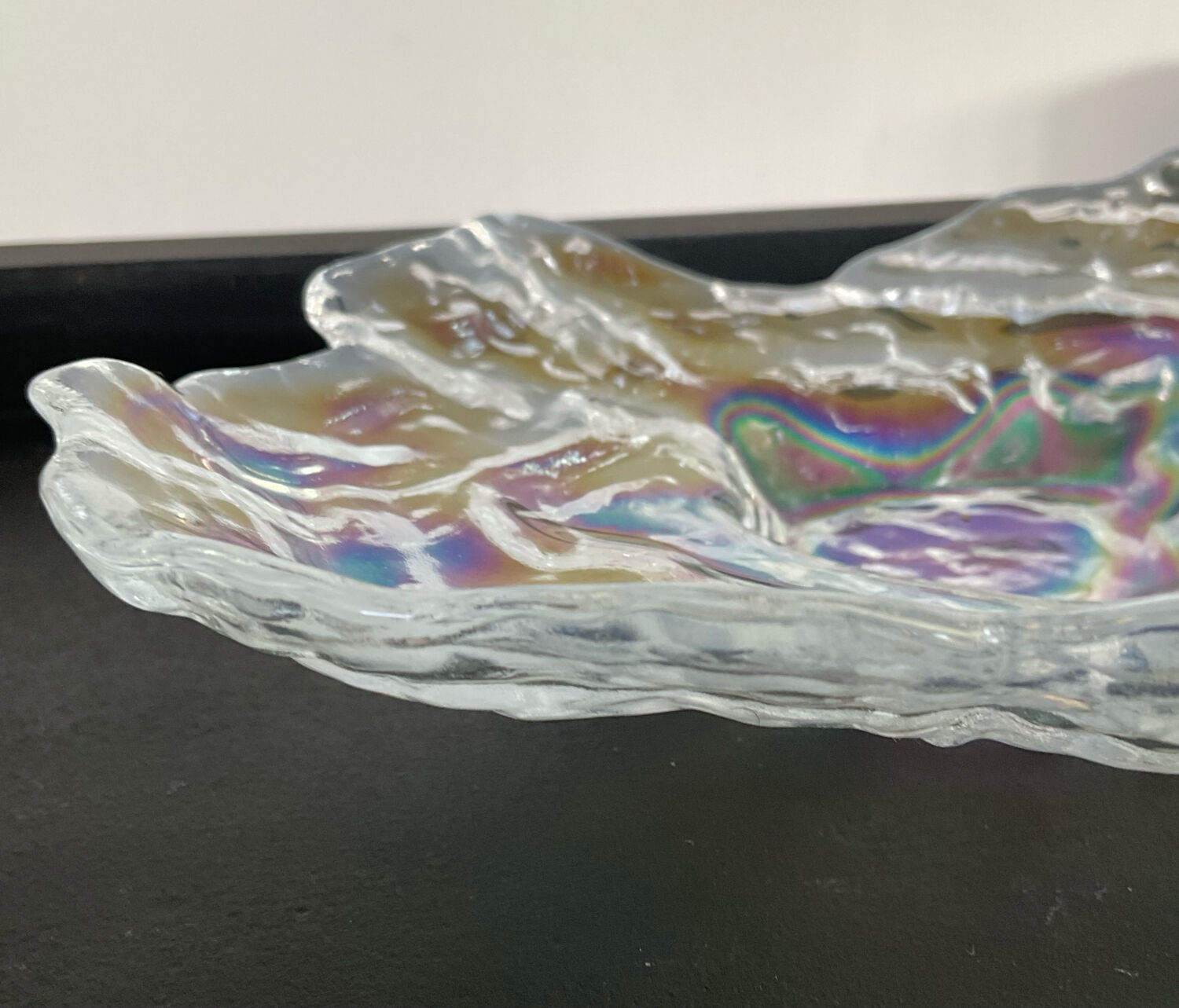 Empty vintage pocket in iridescent glass