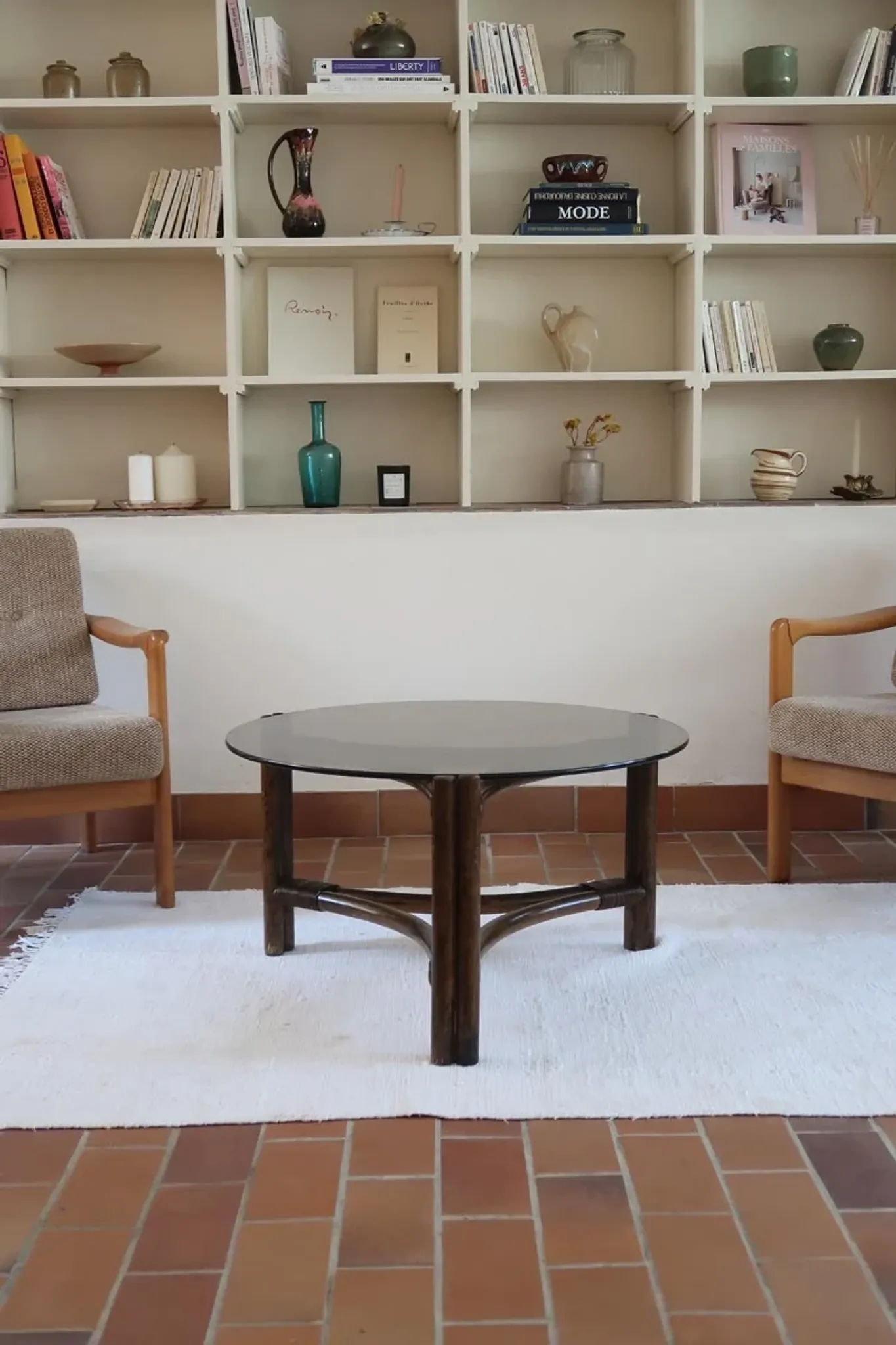 Round coffee table in rattan and smoked glass — 1970s