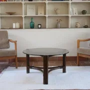 Round coffee table in rattan and smoked glass — 1970s
