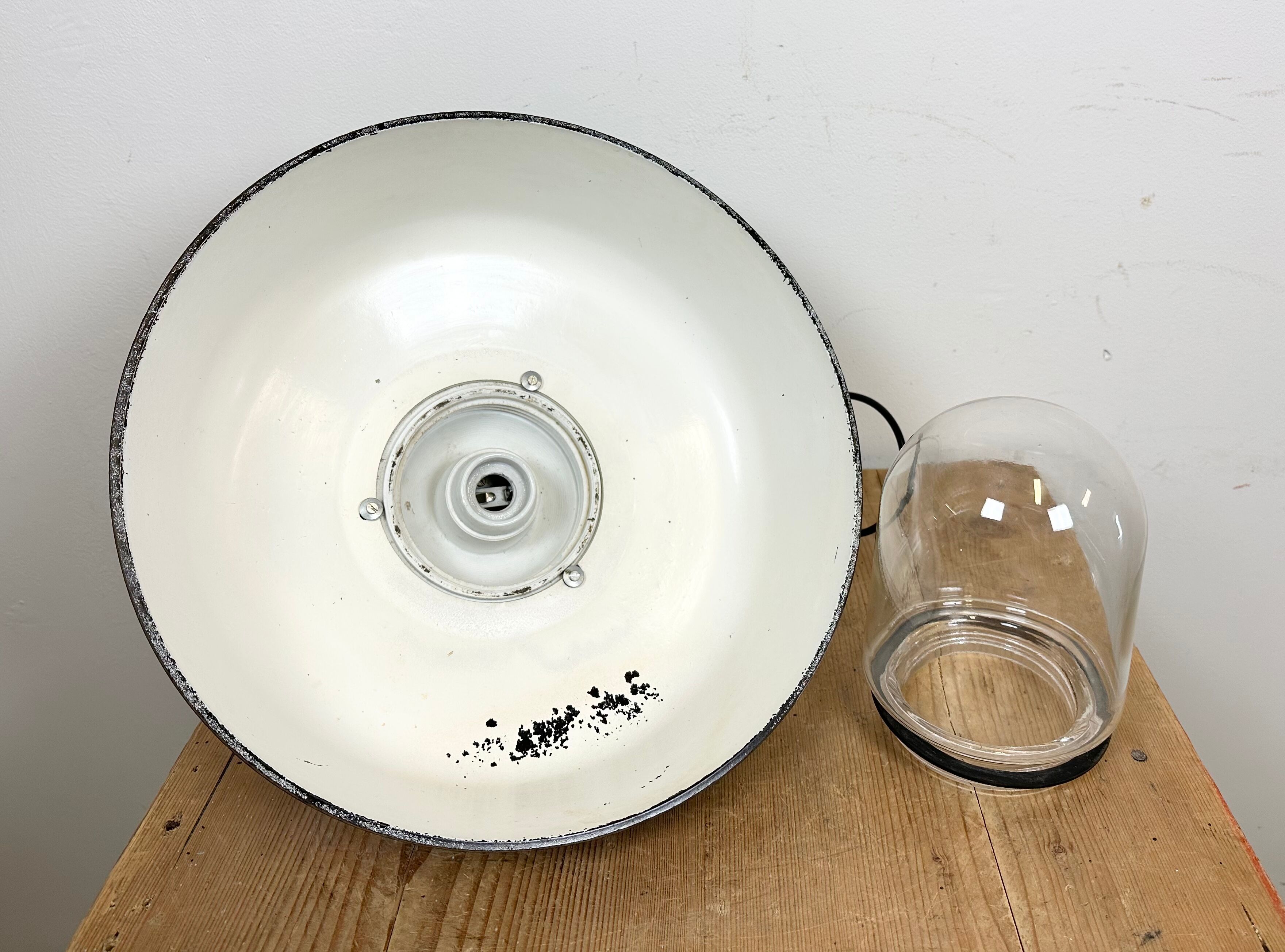 Industrial black enamel lamp with glass cover, 1950s