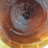 Great old demijohn in amber glass