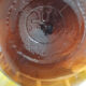 Great old demijohn in amber glass