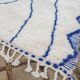 Small natural wool rug, 100 x 200 cm