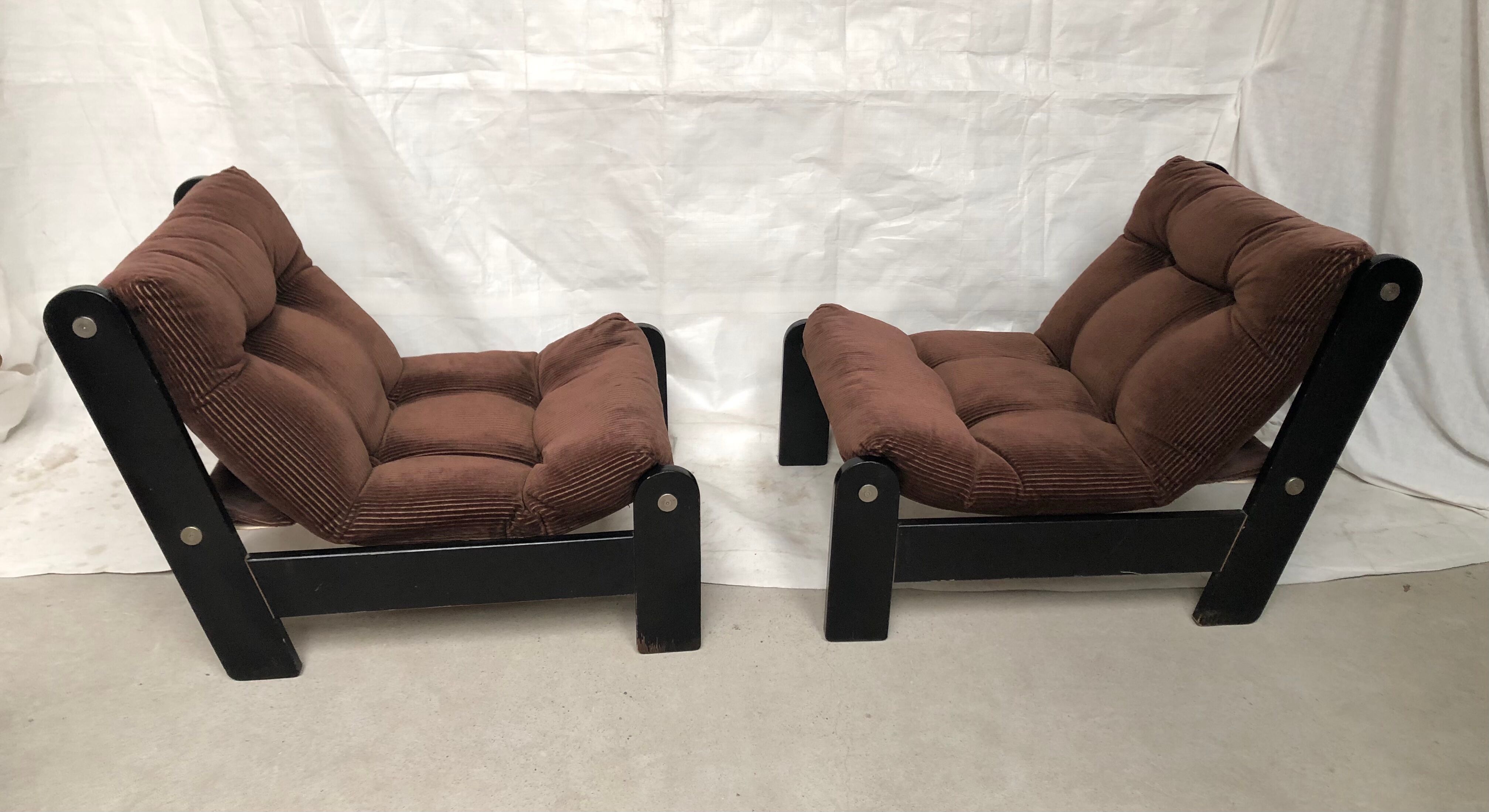 Modernist armchairs wood heaters and brown velvet vintage 70s