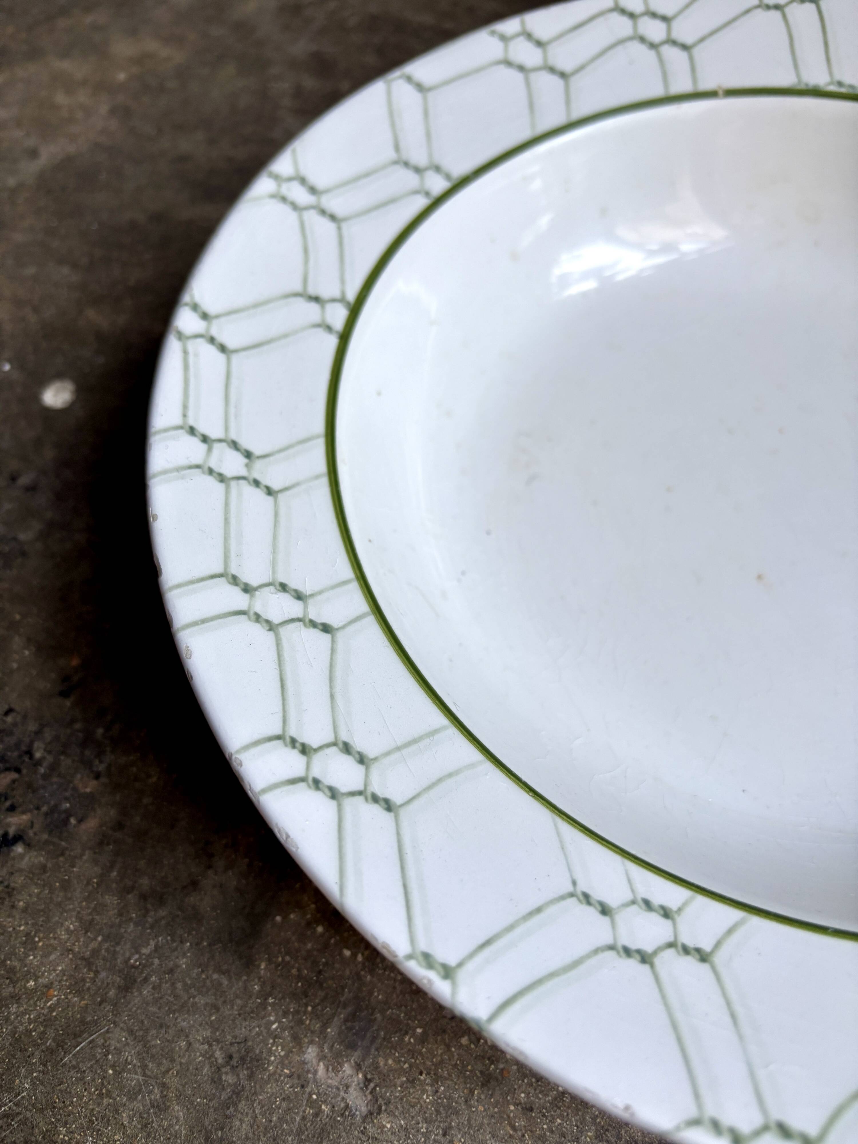 Small round hollow dish by Christian Dior in Italian earthenware