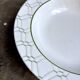 Small round hollow dish by Christian Dior in Italian earthenware