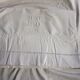 Cotton top sheet, open top edge, embroidered monogram