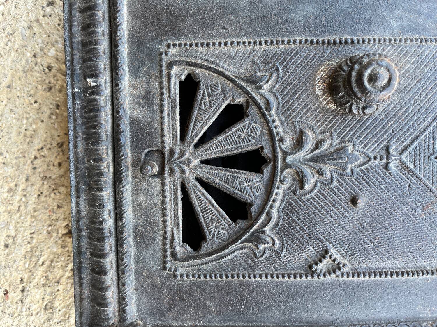 Old 19th century cast iron oven door or fireplace