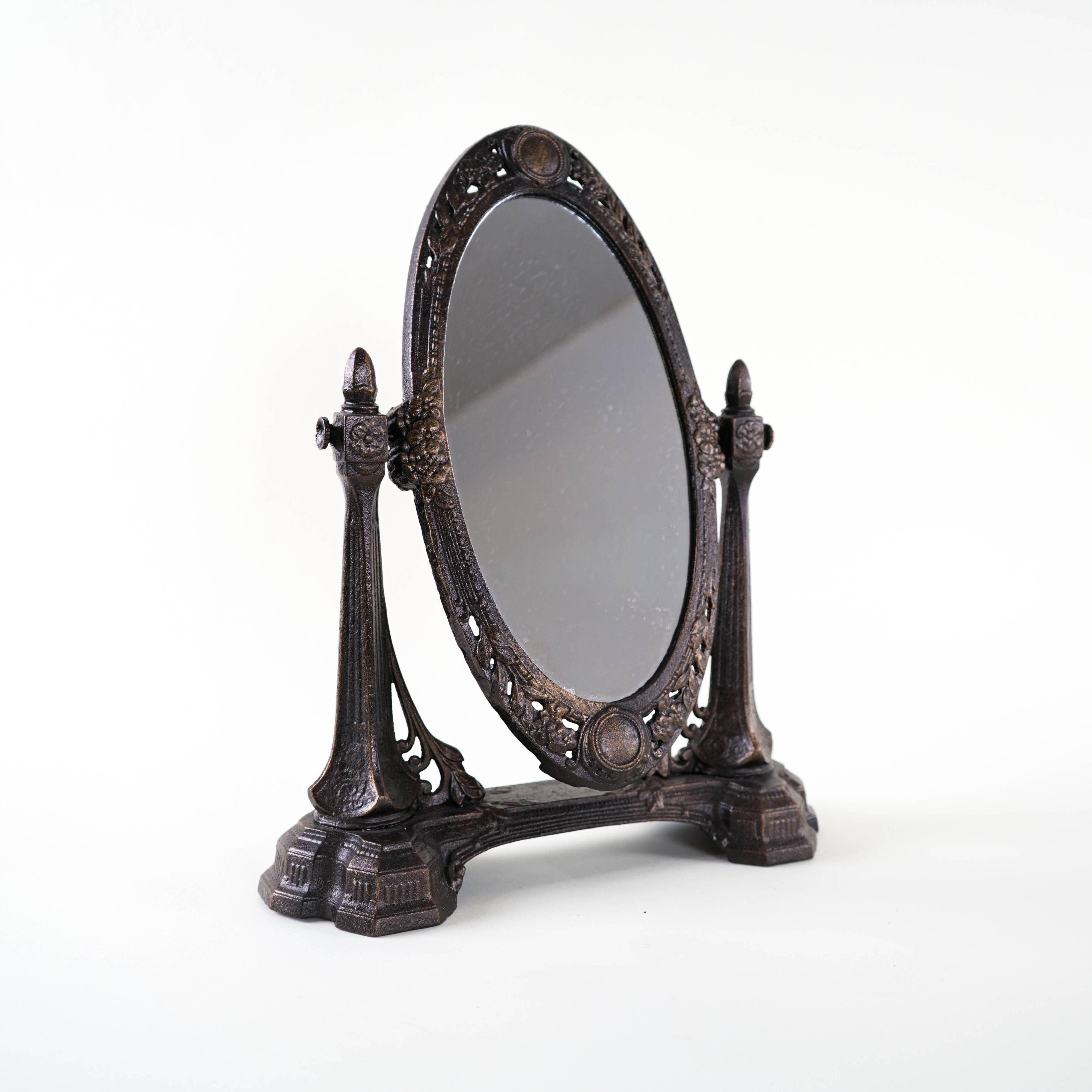 Art Nouveau table mirror with ornamental metal frame, early 20th century