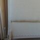 Louis XV style headboard with pearl grey patina, upholstered in off-white bouclette.