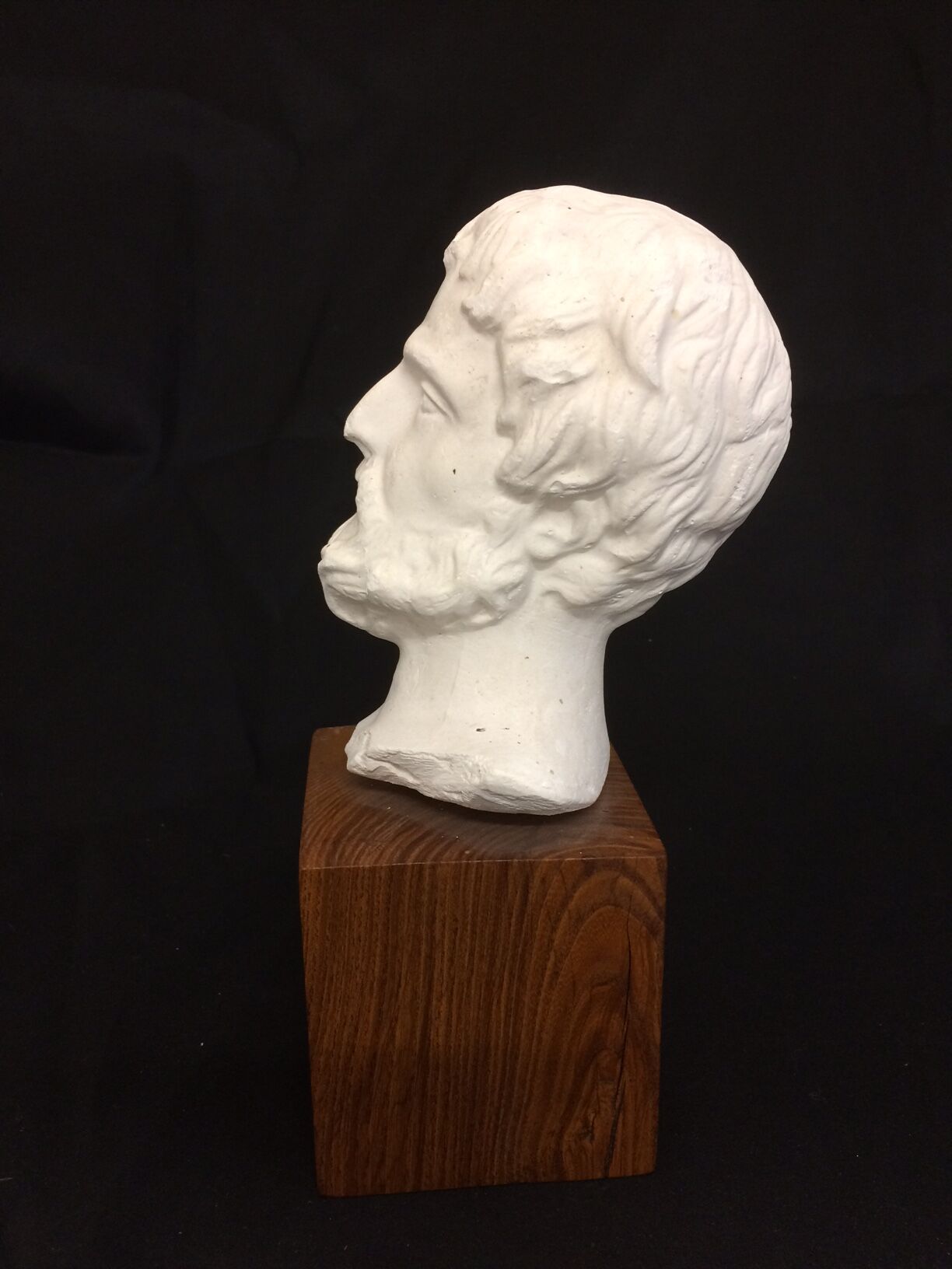 Decorative head in plaster