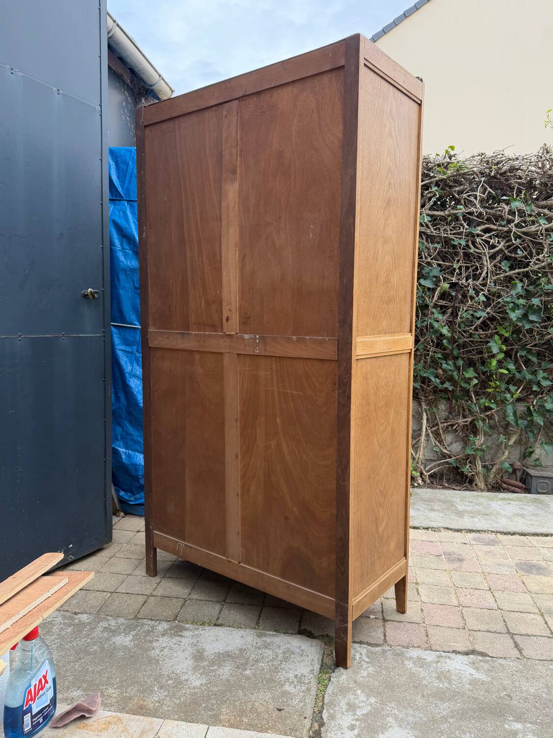 Parisian hotel wardrobe with bevelled mirror, solid raw oak, 1920.