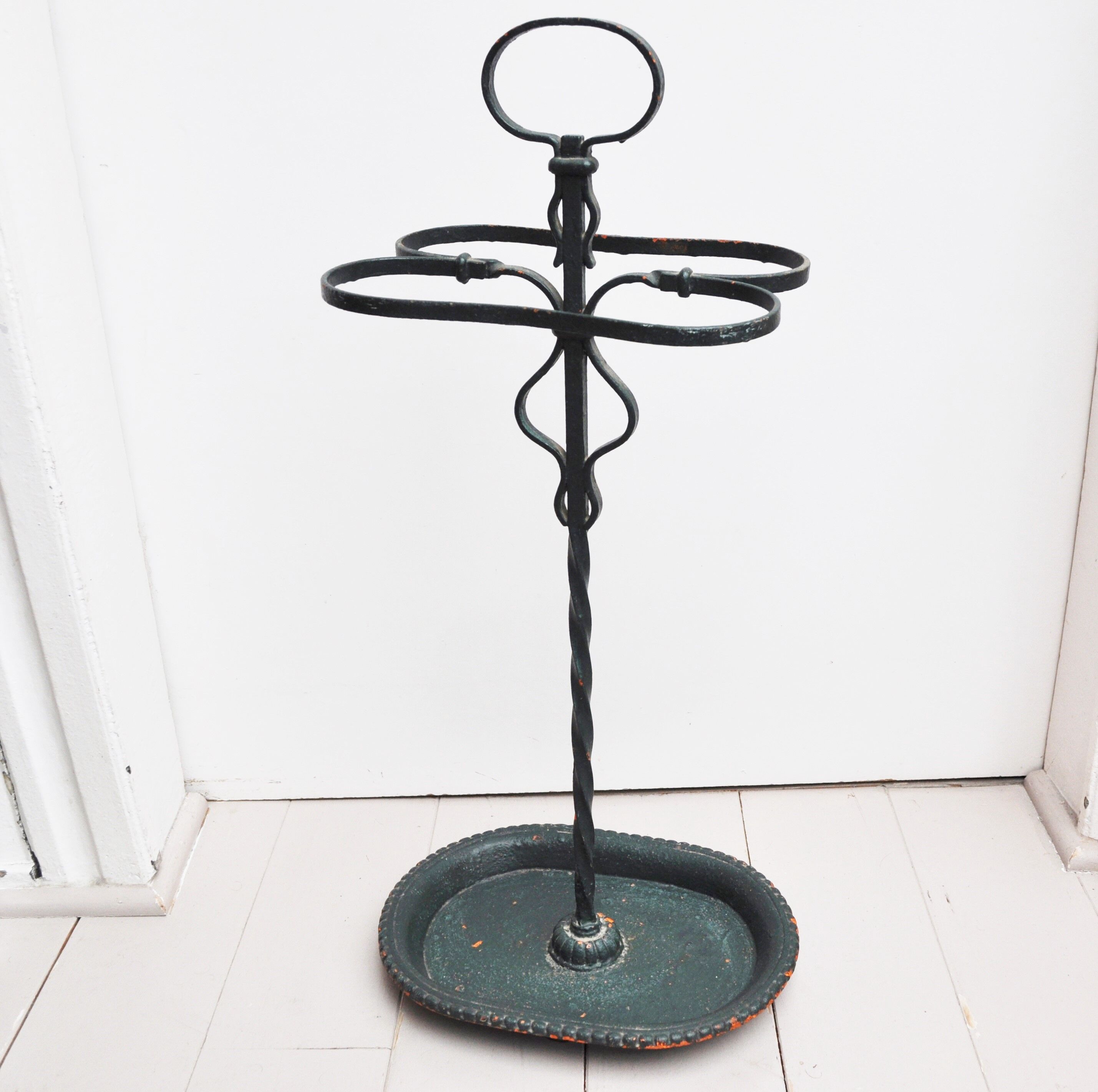 Wearing dark green metal 50s umbrella