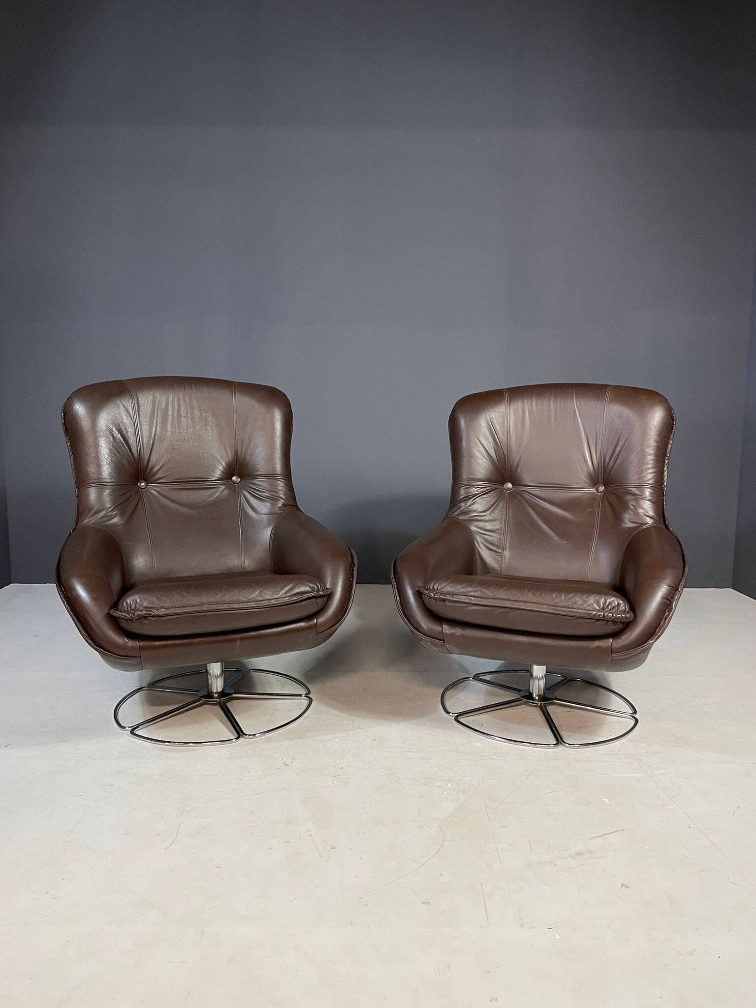 Pair of leather swivel armchairs by PEEM, Finland, 1970s