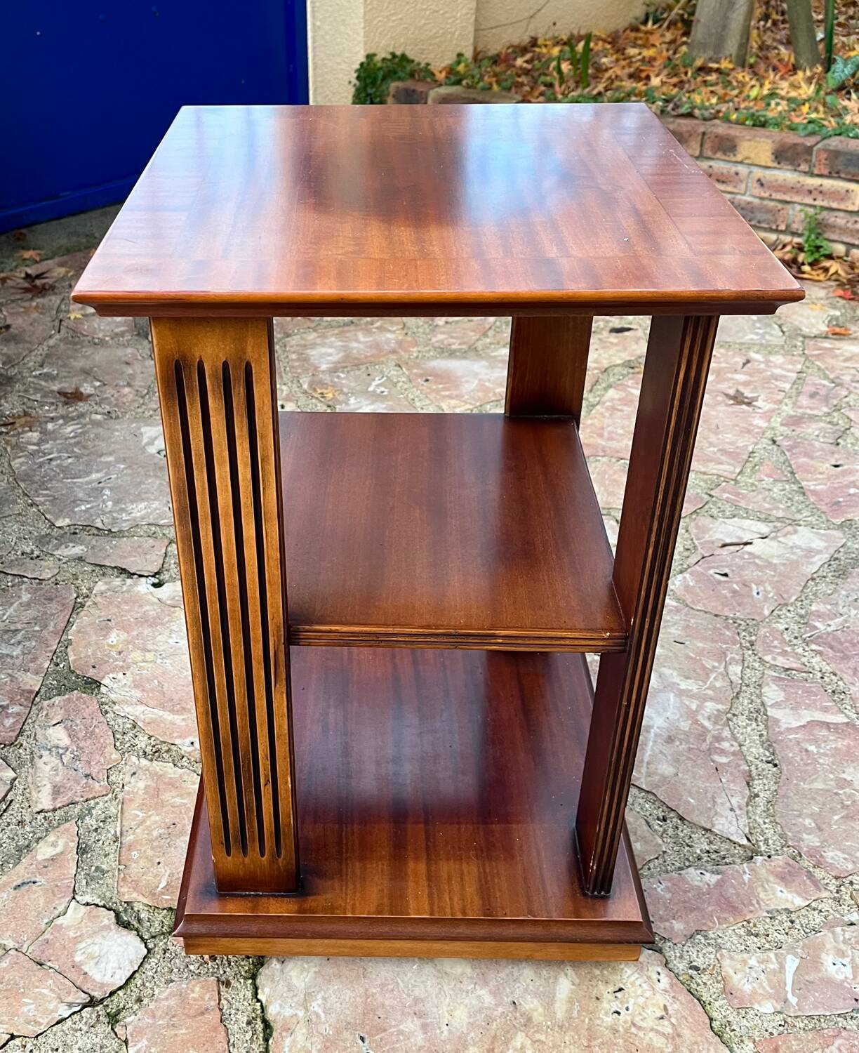 Vintage wooden shelf on caster legs