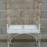 Bird cage with its wheeled holder