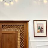 Rattan wardrobe with compass feet