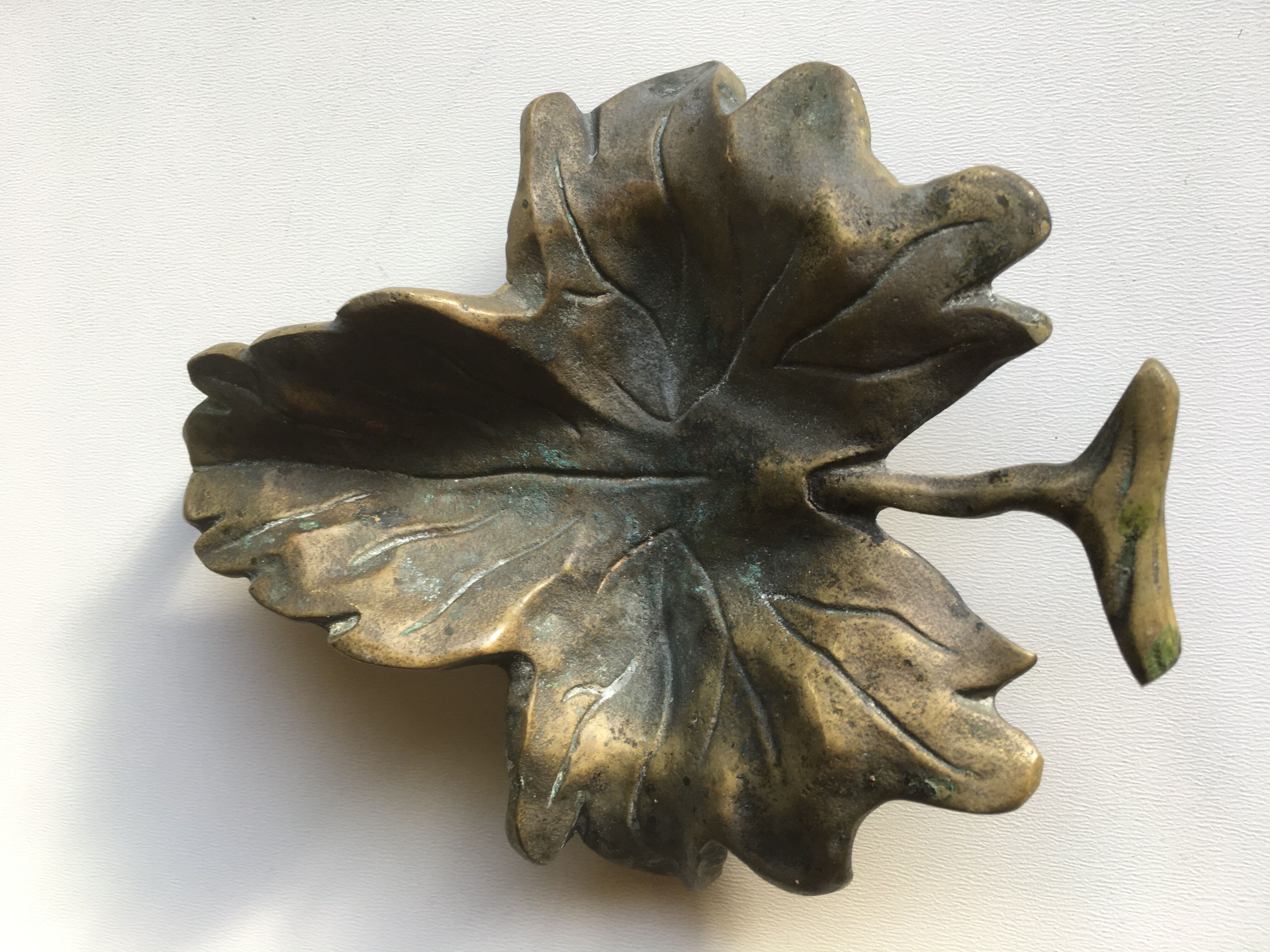 Empty pocket or ashtray leaf in old bronze