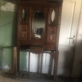 Very decorative coat rack with bevelled mirror.