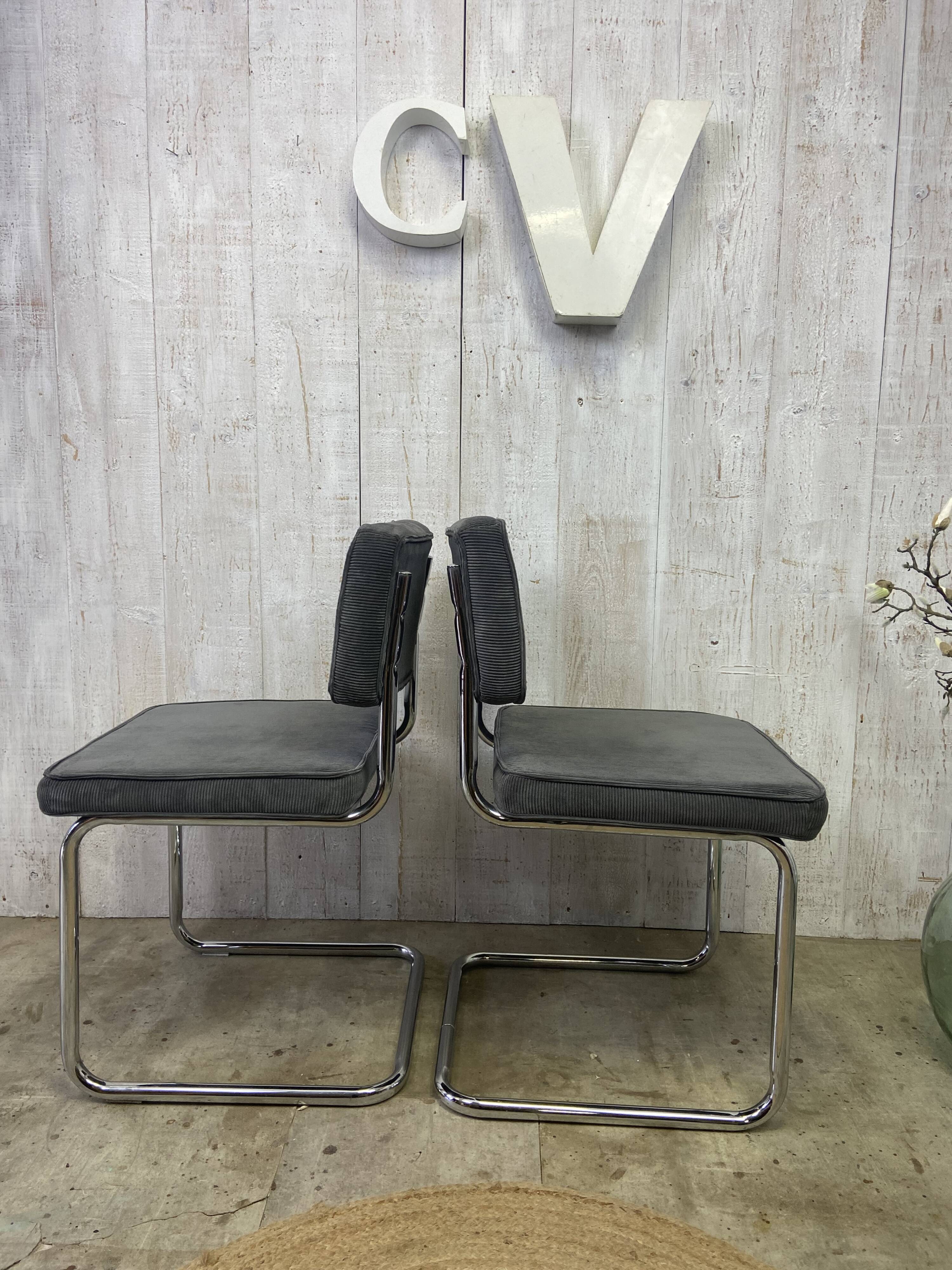Pair of chrome and velvet chairs