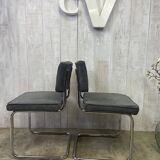 Pair of chrome and velvet chairs