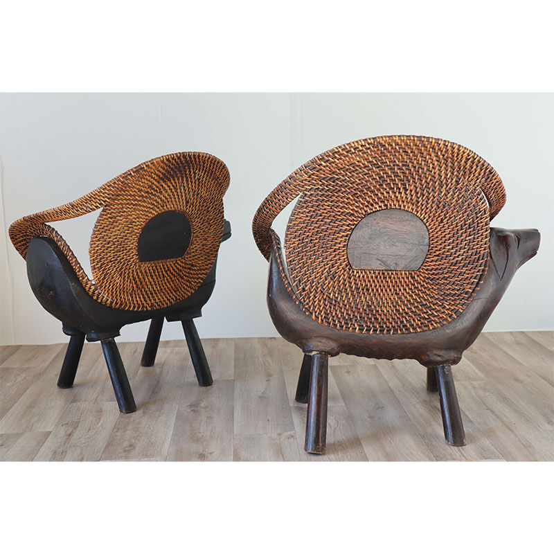 Paire de fauteuils vintage bois sculpté et rotin 1960