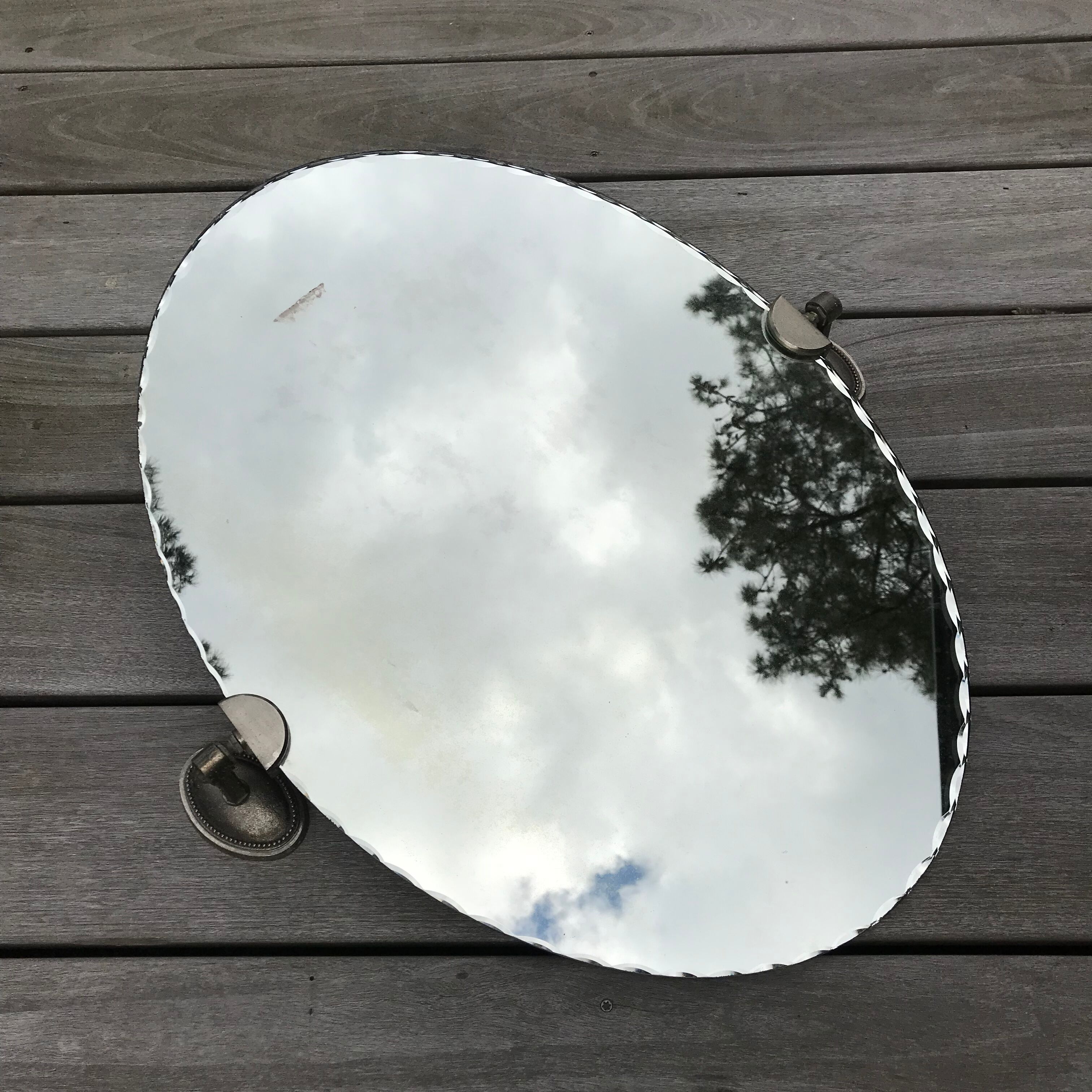 Oval mirror bevelled with removable metal media 43x60cm
