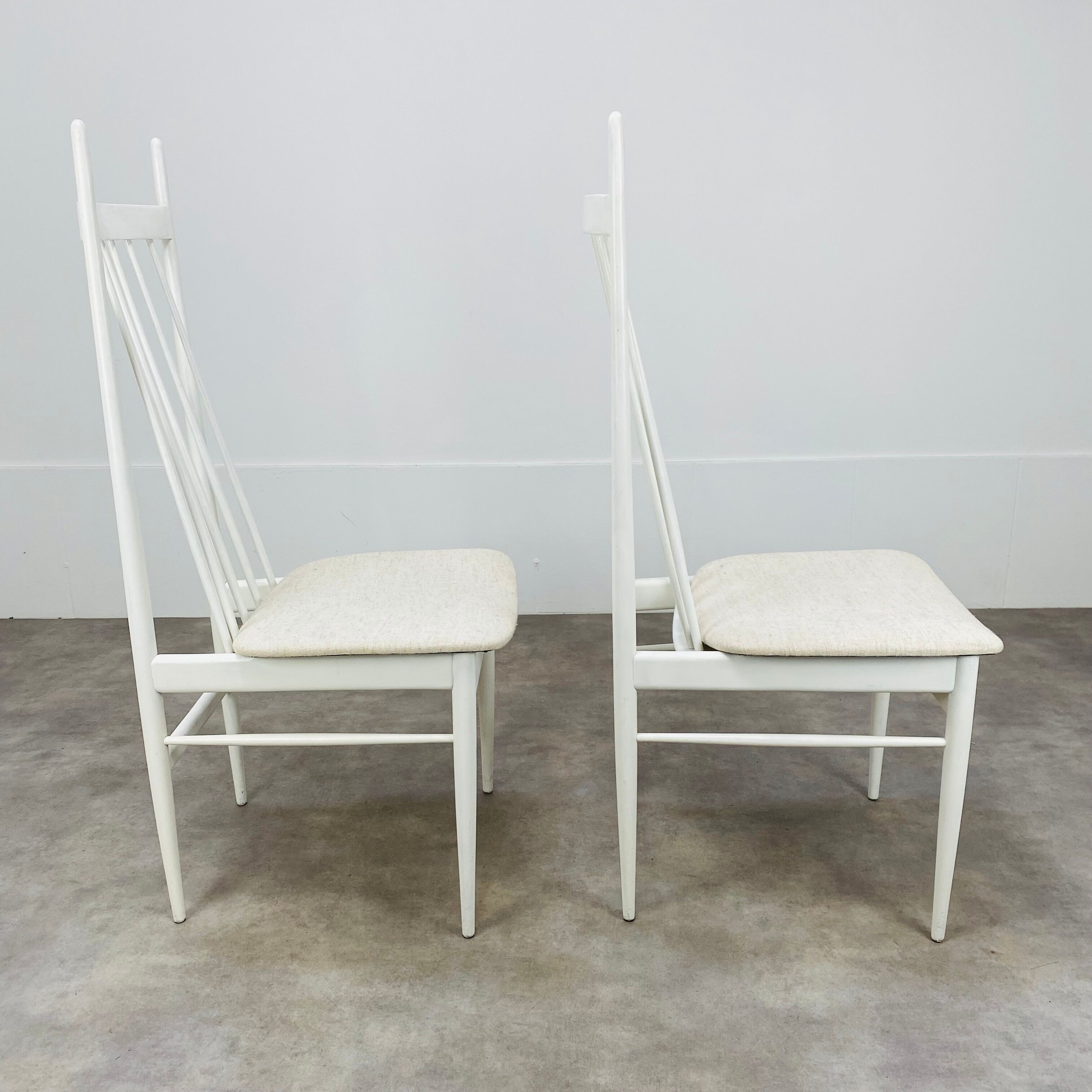 2 Scandinavian chairs with white bars from the 60s