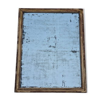 Antique mirror in a gilded wooden frame in the Louis XVI style, 19th century, 62x78 cm.