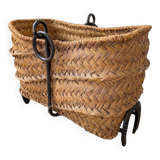 Magazine rack or log rack in straw with brutalist base from the 50s