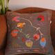 Colorful Suzani cushion in handmade embroidered wool