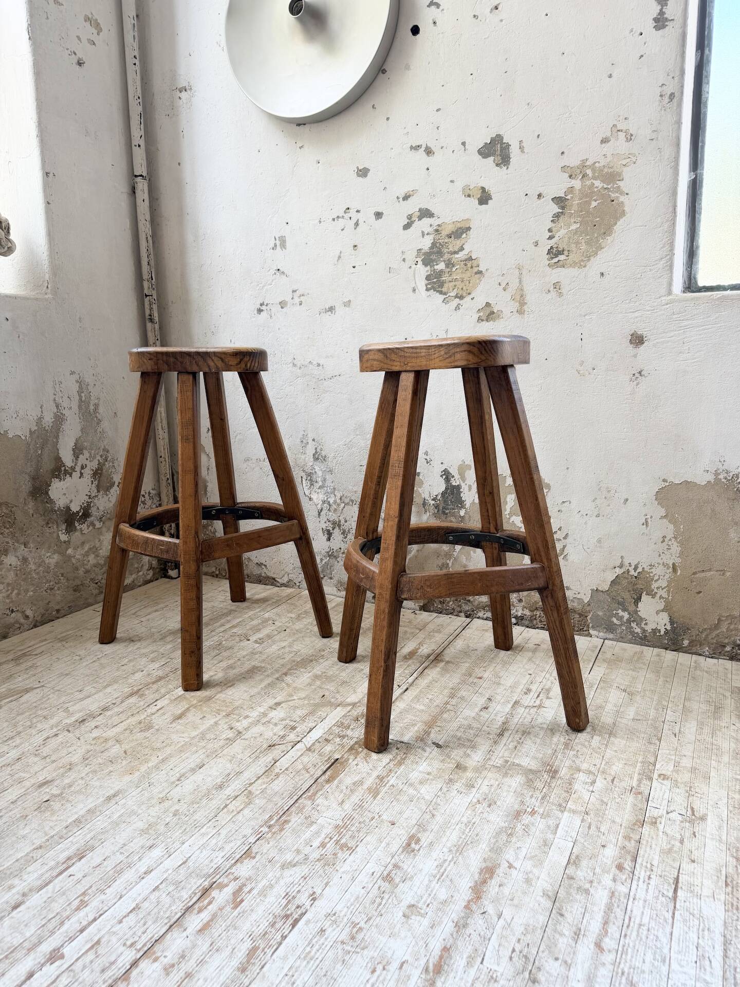 Pair of Henri Bataille stools in oak