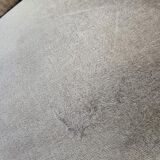 Vintage beige two-seater canapé with fringes.