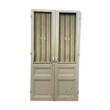 Double closet doors Paneled and screened 20th century