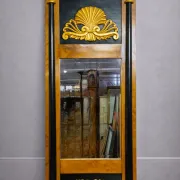 Empire period mirror in gilded and blackened wood – Shell pediment