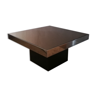 Square pedestal coffee table with mirror top