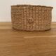 Small oval woven basket in natural blonde wicker — vintage, Czech Republic 1980s
