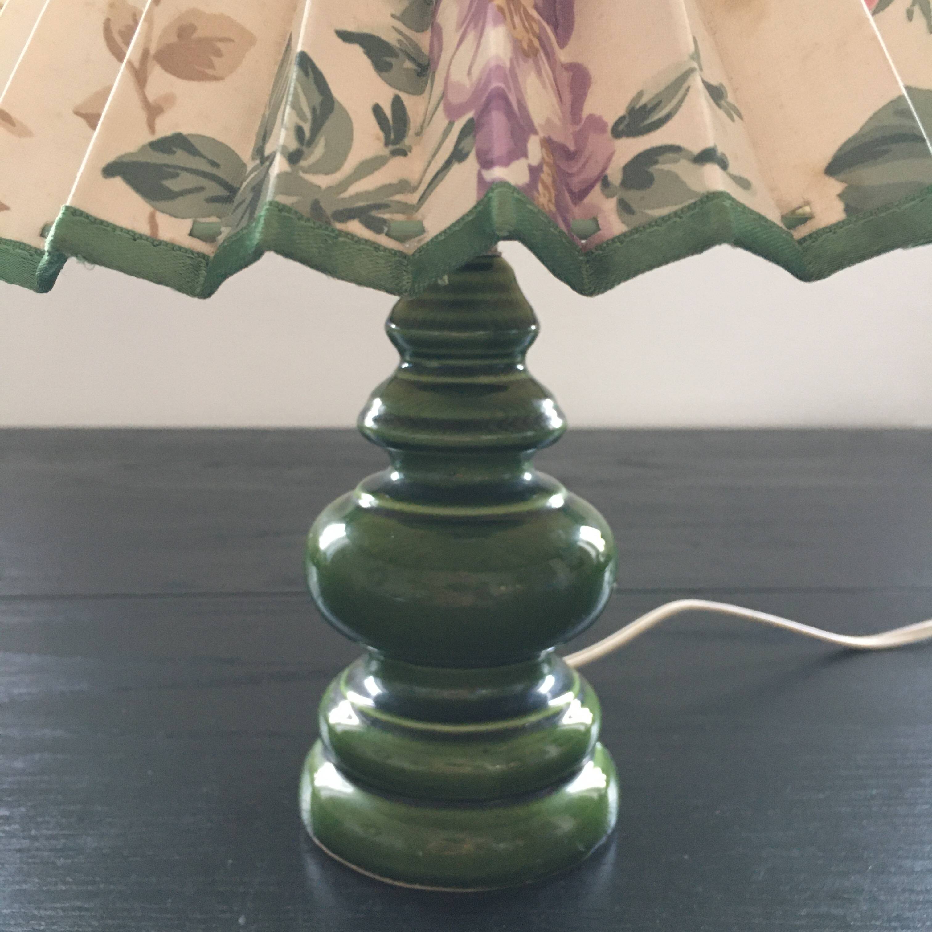 Green ceramic lamp and flowered lampshade