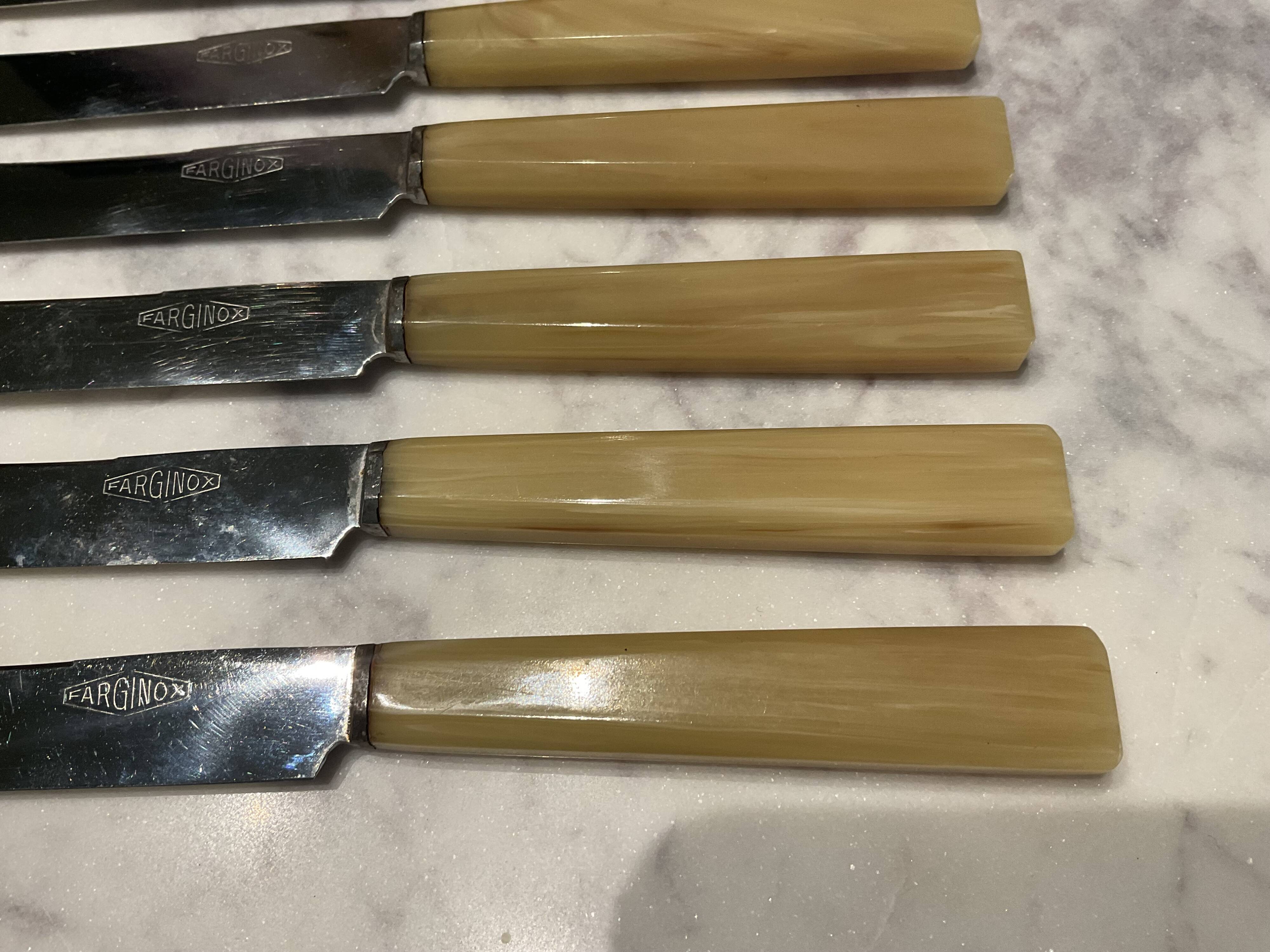 12 cheese knives. Vintage