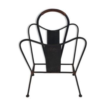 Black lacquered metal magazine rack with brown leather.