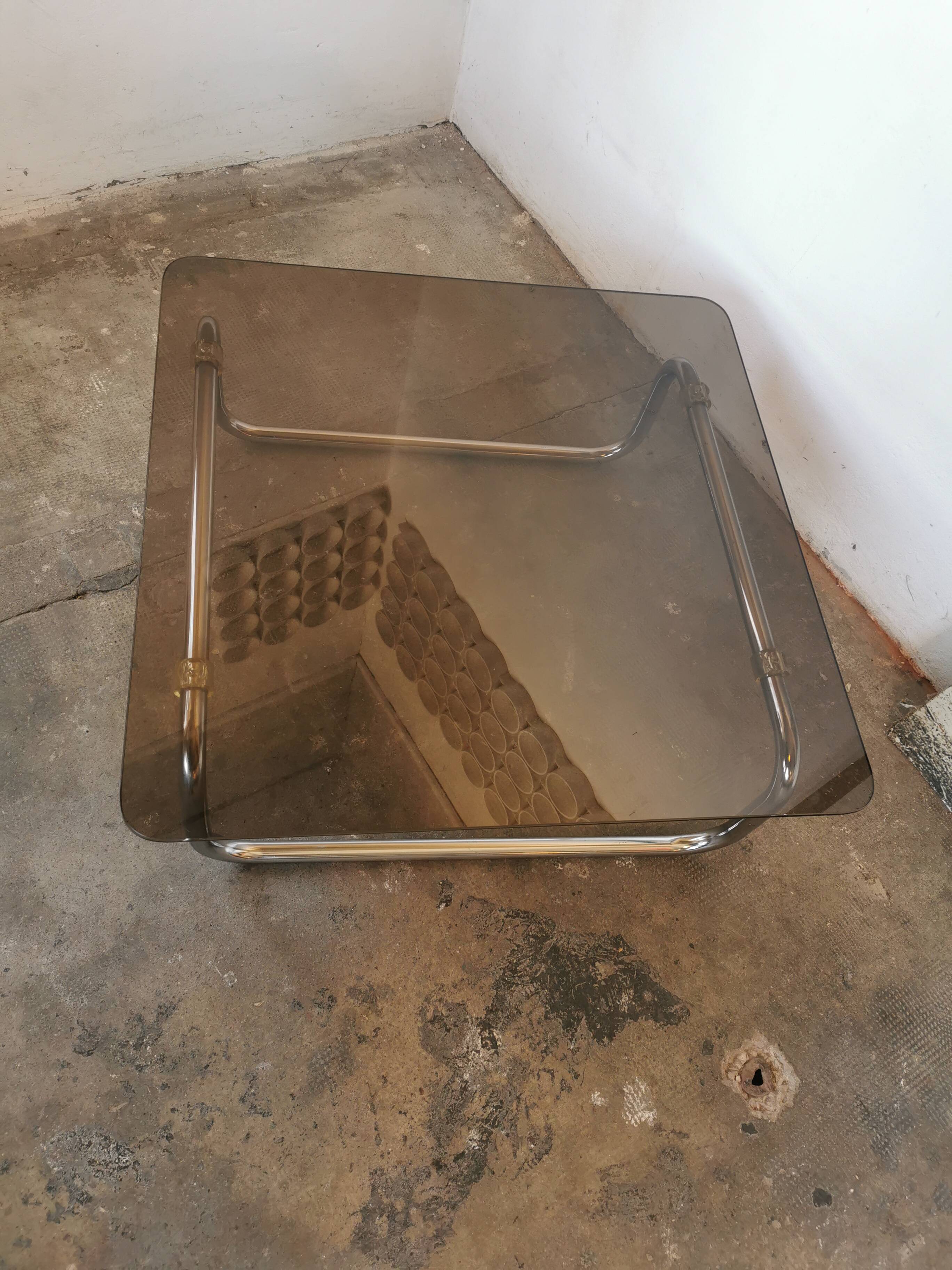Chrome tubular metal and smoked glass coffee table