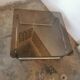 Chrome tubular metal and smoked glass coffee table
