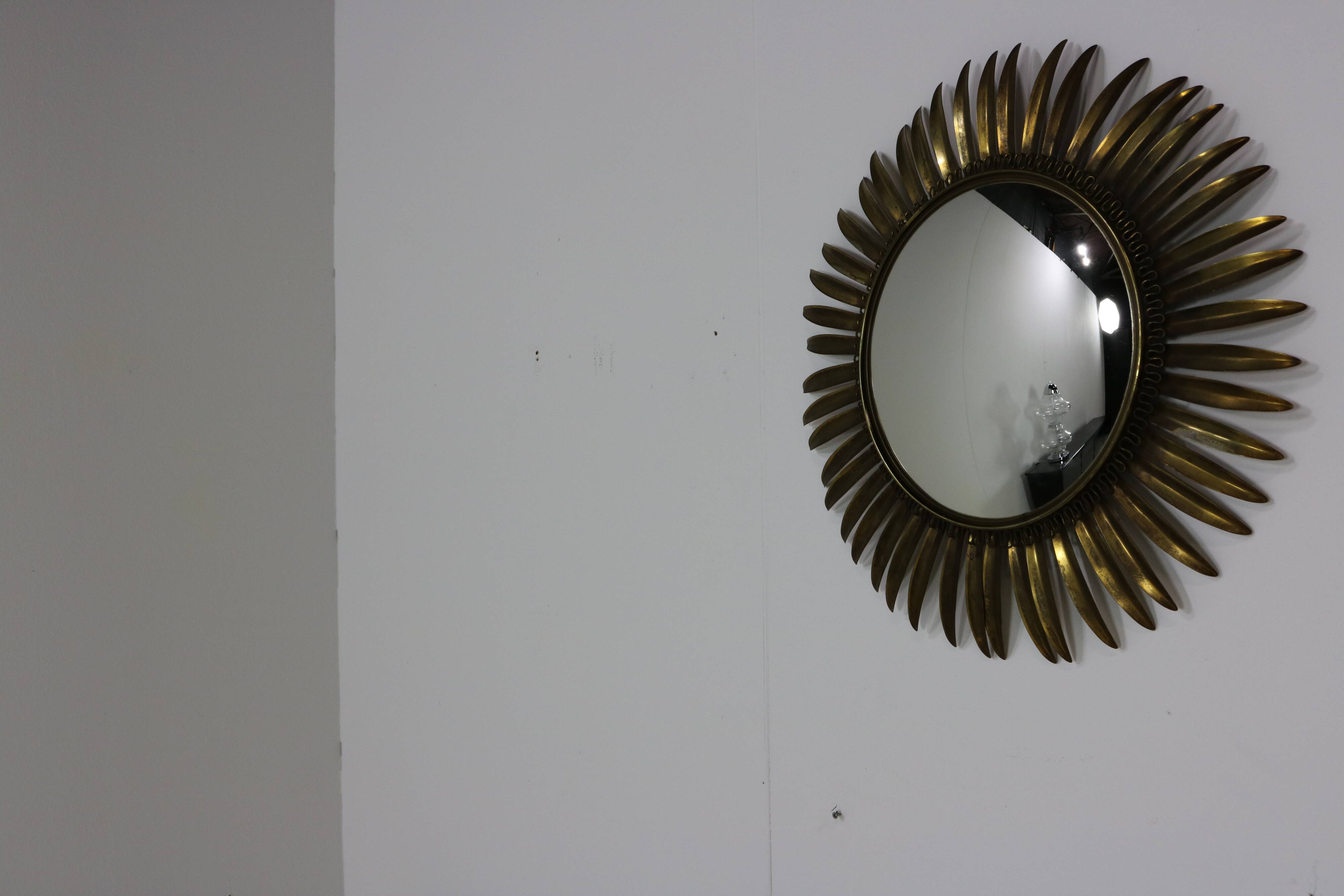 Typical midcentury sunburst wall mirror