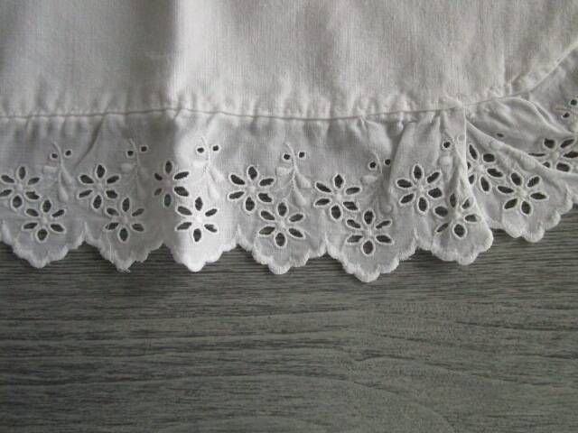 Antique embroidered crescent-shaped cradle pillowcase