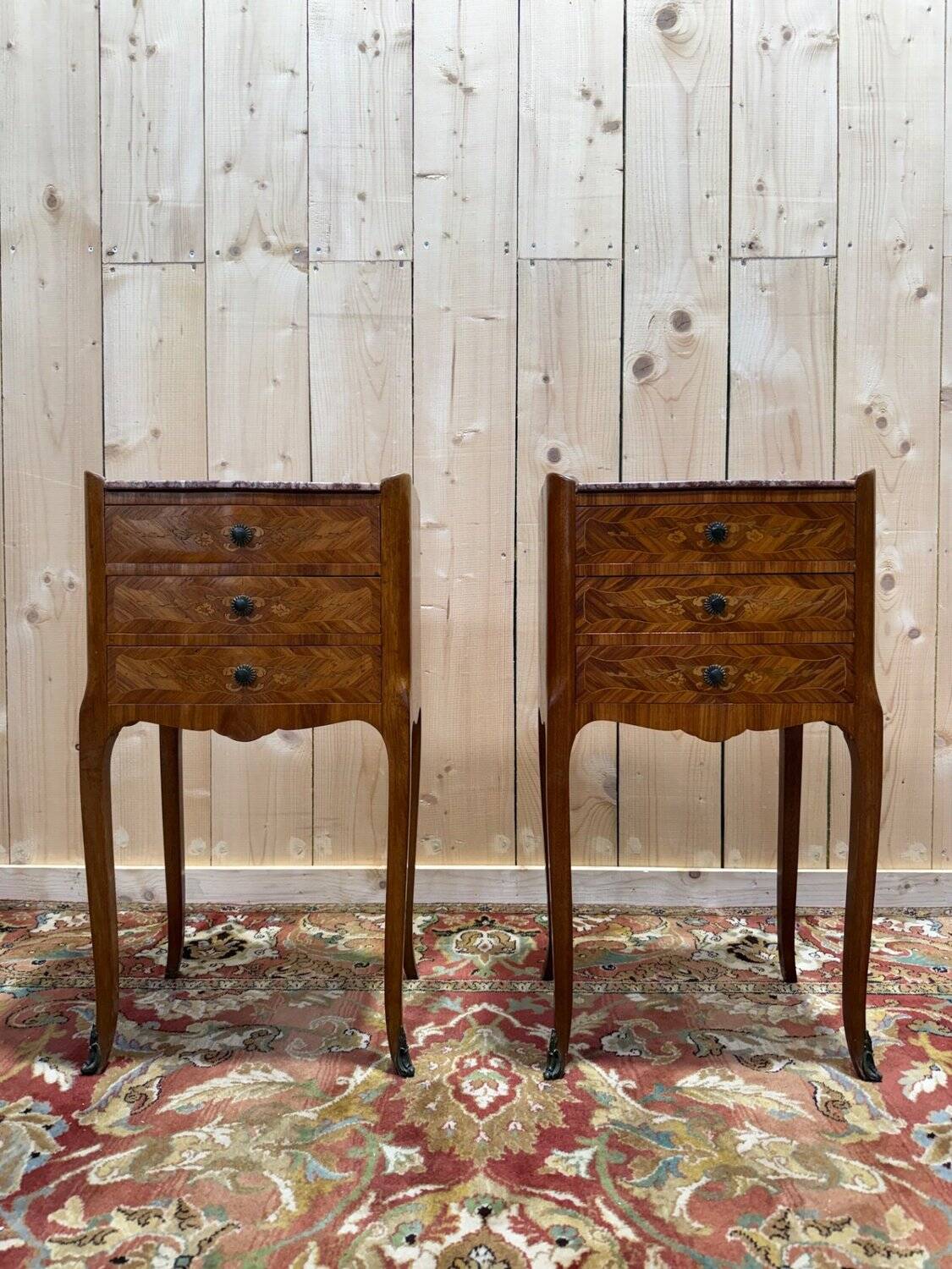 Pair of Louis XV style bedside tables in marquetry.