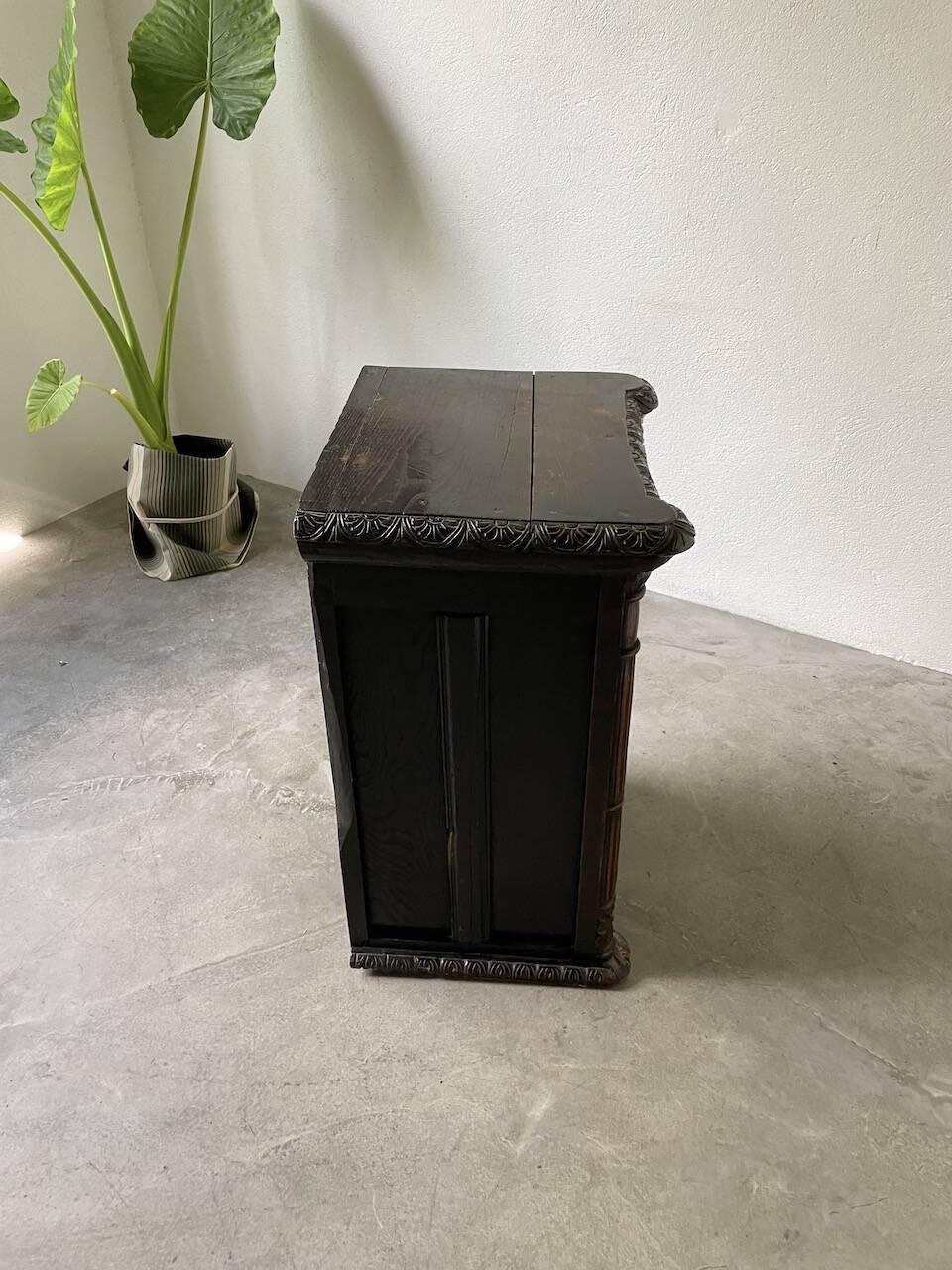19th century chest of drawers in carved blackened pine