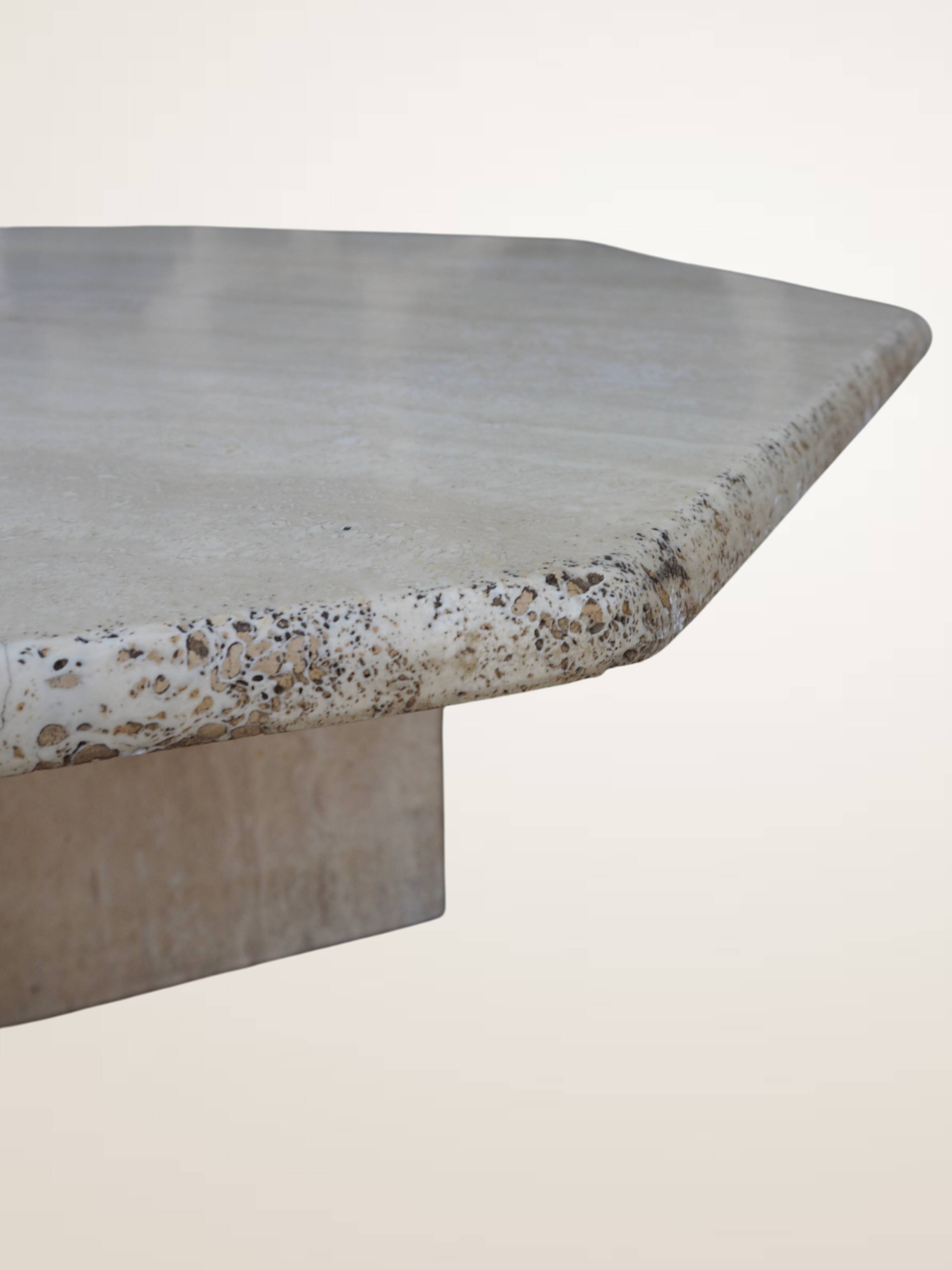 Octagonal coffee table in travertine