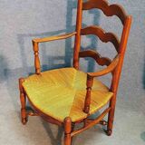 Old straw armchair