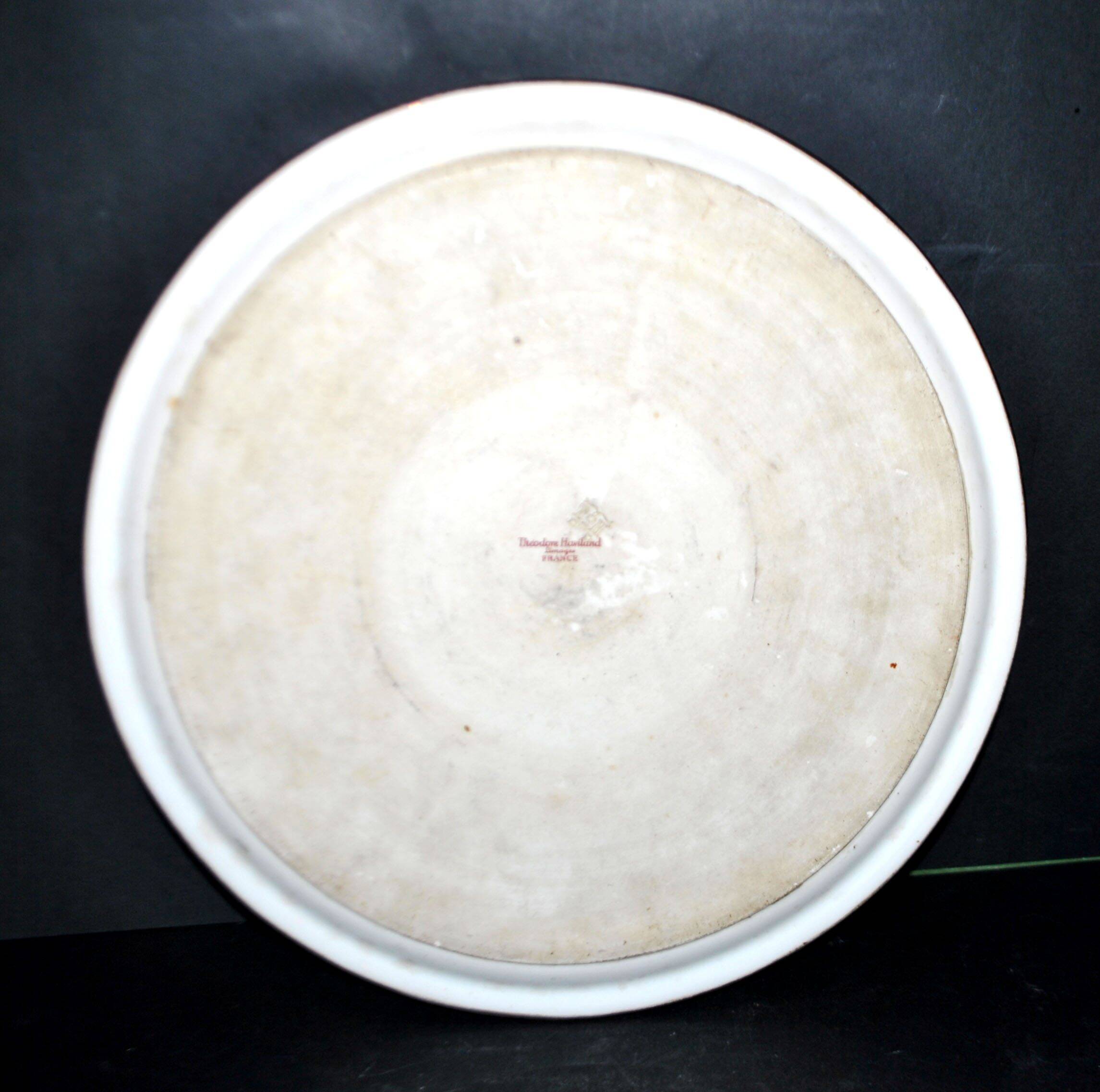 Haviland pie dish in Limoges porcelain with a Minerva silver rim.